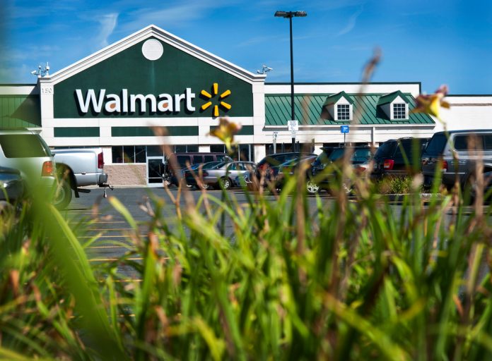 WALMART IS SAID to be in talks to acquire Humana. / BLOOMBERG FILE PHOTO/PAUL TAGGART