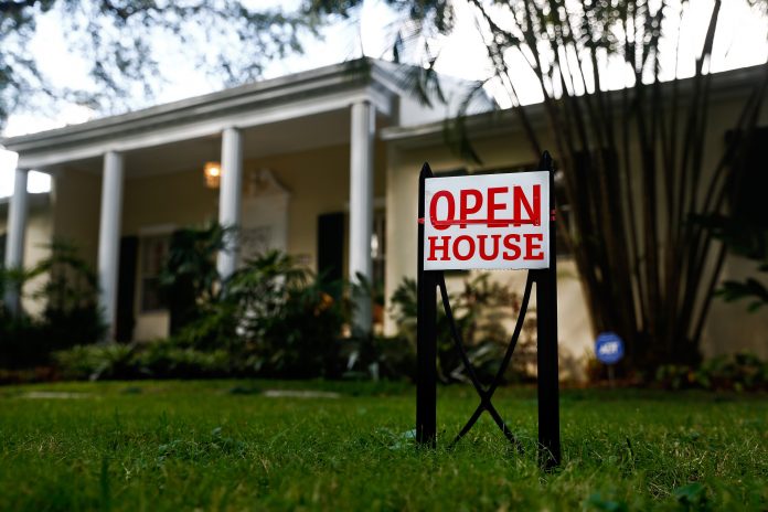 U.S. EXISTING HOME SALES rose 3 percent month to month in February and median sales price rose 5.9 percent year over year to $241,700. / BLOOMBERG FILE PHOTO/SCOTT MCINTYRE