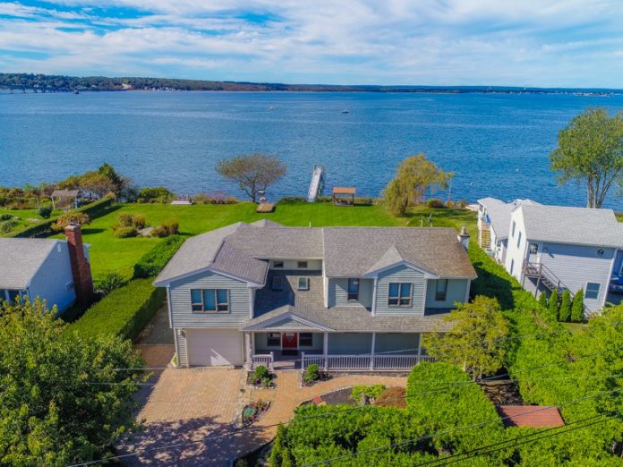 A BEACHFRONT HOME at 229 Seaside Drive in Jamestown sold recently for $1.48 million. / COURTESY LILA DELMAN REAL ESTATE INTERNATIONAL