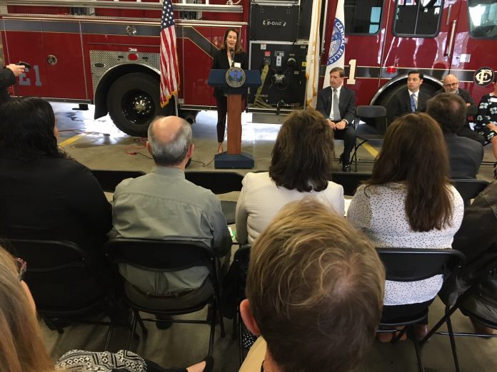 THE RHODE ISLAND FOUNDATION awarded more than $280,000 in grants to improve health care to improve health care in Rhode Island. Harvard Pilgrim Health Care Foundation President Karen Voci, who serves on the advisory committee that recommended the grants, speaks at the announcement Friday morning at the Central Falls Fire Station. / COURTESY RHODE ISLAND FOUNDATION THE RHODE ISLAND FOUNDATION awarded more than $280,000 in grants to improve health care to improve health care in Rhode Island. Harvard Pilgrim Health Care Foundation President Karen Voci, who serves on the advisory committee that recommended the grants, speaks at the announcement Friday morning at the Central Falls Fire Station. / COURTESY RHODE ISLAND FOUNDATION