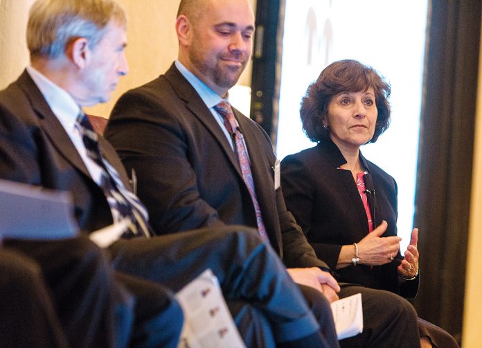 INDUSTRY CONCERNS: Members of the second panel at the 2018 Spring Providence Business News Health Care Summit discuss cost-of-care concerns in the industry. From left, Al Charbonneau, executive director of the Rhode Island Business Group on Health; David Burnett, acting chief operating officer for Neighborhood Health Plan of Rhode Island; and R.I. Health Commissioner Marie L. Ganim.  / PBN PHOTO/RUPERT WHITELEY