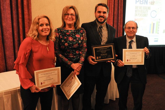 PBN STAFF WRITER Eli Sherman, second from right, earned first place honors in the Rhode Island Press Association's annual journalism contest in the Investigative/Analytical News Story category ahead of the Providence Journal's Amanda Milkovits, left, Katherine Gregg and representing Katie Mulvaney on the far right, Journal Executive Editor Alan Rosenberg. / COURTESY PAUL J. SPETRINI PHOTOGRAPHY