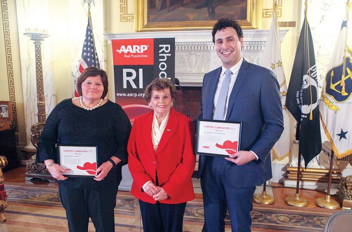 CAPITOL CAREGIVERS: Sen. Maryellen Goodwin, left, and Rep. Aaron Regunberg, right, were named 2017 AARP Capitol Caregivers for their earned paid sick leave legislation passed last year. They are pictured with AARP Rhode Island Director Kathleen Connell holding their certificates. / COURTESY AARP CAPITOL CAREGIVERS: Sen. Maryellen Goodwin, left, and Rep. Aaron Regunberg, right, were named 2017 AARP Capitol Caregivers for their earned paid sick leave legislation passed last year. They are pictured with AARP Rhode Island Director Kathleen Connell holding their certificates. / COURTESY AARP