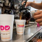 DUNKIN' BRANDS GROUP reported first-quarter profit of $50.2 million. / BLOOMBERG FILE PHOTO/RON ANTONELLI