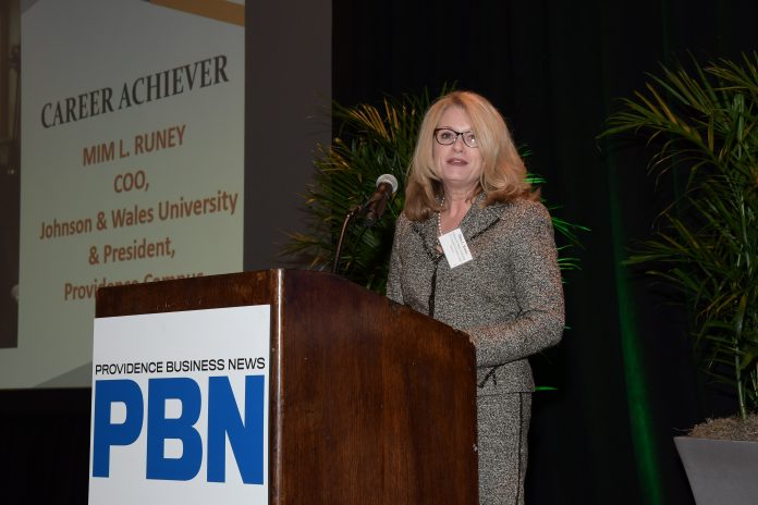 JOHNSON & WALES UNIVERSITY Chief Operating Officer and President of the Providence Campus Mim L. Runey speak to the crowd at PBN's third annual C-Suite Awards dinner after receiving the program's Career Achiever award. / PBN PHOTO/MIKE SKORSKI