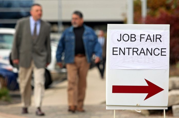 PROVIDENCE METRO UNEMPLOYMENT ticked down in February, as the civilian labor force grew and the number of unemployed declined slightly. / BLOOMBERG FILE PHOTO/TIM BOYLE