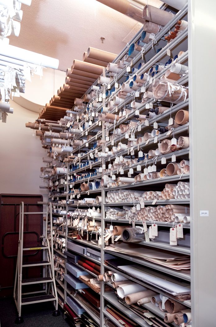 LITTLE SPACE: Documents preserving Rhode Island’s history, including railroad maps and plats, among others, are stacked floor to ceiling at the Rhode Island state archives building in Providence.  / PBN PHOTO/MICHAEL SALERNO
