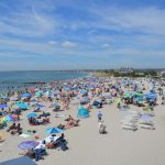 THREE RHODE ISLAND state beaches will be open weekends from 9 a.m. to 6 p.m. starting Saturday. Above, beachgoers are pictured at Roger Wheeler State Beach in Narragansett. / COURTESY OFFICE OF GOV. GINA M. RAIMONDO
