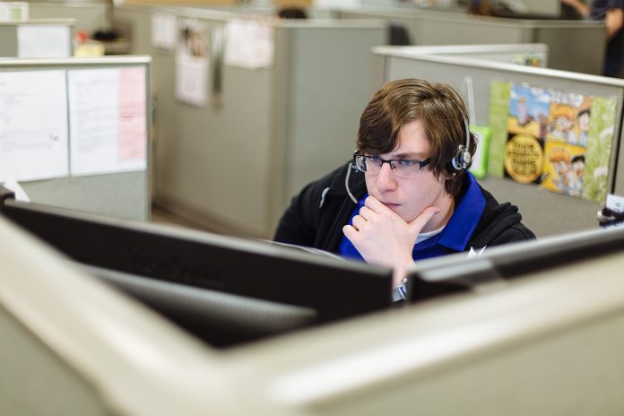 BUILDING FOR THE FUTURE: Vertikal6’s apprenticeship program is now the preferred way to bring on staff. Here, Dan Dionne, who is part of the program, works at the company’s Pawtucket offices. / PBN PHOTO/RUPERT WHITELEY