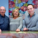 FAMILY-RUN: Joe Audette, left, owner and president of M.R.T. Jewelers, runs his business with his wife, Janice, and son ­David, vice president. The family-run business offers jewelry repair and sales. / COURTESY M.R.T. JEWELERS