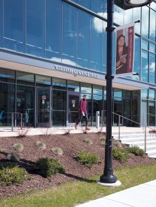 CLEAR VIEW: The brick façade of Gaige Hall, first built with the building in 1966, on the campus of Rhode Island College has been replaced by a large window curtainwall, allowing natural light to enter the building. The older hallways within the building have also been upgraded.