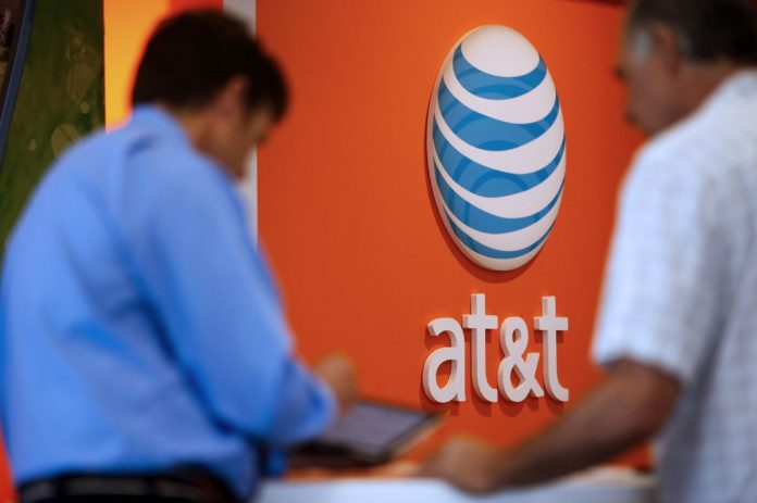 AT&T HAS RECEIVED APPROVAL to acquire Time Warner. BLOOMBERG FILE PHOTO/PATRICK T. FALLON