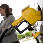RHODE ISLAND regular gas prices increased 2 cents this week to average $2.95 per gallon, 11 cents above the national average. / BLOOMBERG FILE PHOTO/DANIEL ACKER