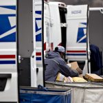 FOUR INDIVIDUALS pleaded guilty to federal tax charges related to vehicle maintenance vendors for the United States Postal Service in Rhode Island. / BLOOMBERG FILE PHOTO/ANDREW HARRER