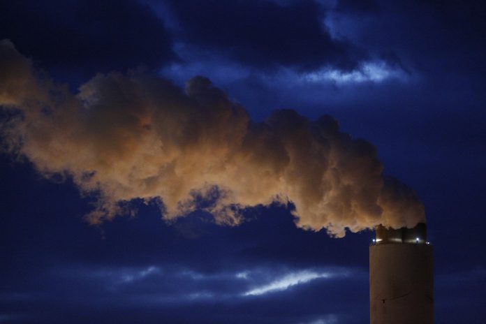 THE REGIONAL GREENHOUSE GAS Initiative completed its 40th auction, selling carbon dioxide allowances for a clearing price of $4.02, generating a total of $55.4 million for the nine participating states. / BLOOMBERG FILE PHOTO/LUKE SHARRETT