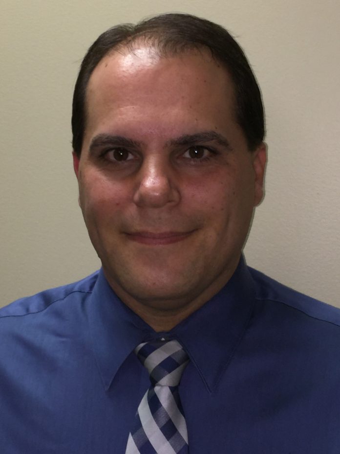 BRIAN SILVIA is the treasurer of the city of Warwick but will be moving to the position of finance director for the town of Coventry in July. / COURTESY BRIAN SILVIA