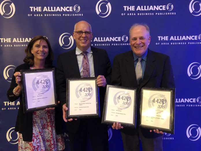 NATIONAL HARDWARE: From left, PBN Director of Sales and Marketing Annemarie Brisson, President and Publisher Roger C. Bergenheim and Editor Mark S. Murphy celebrate the newspaper's recognition as being among the top two newspapers and websites in the nation at the annual Alliance of Area Business Publishers' editorial excellence competition. / PBN PHOTO