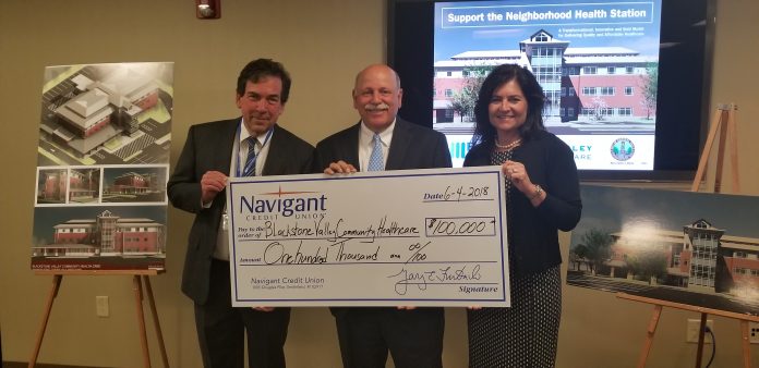 NAVIGANT CREDIT UNION recently provided a $100,000 grant toward the Central Falls Neighborhood Health Station, a project by Blackstone Valley Community Health Care. From left: Raymond Lavoie, BVCHC executive director; Gary Furtado, president and CEO of Navigant Credit Union; and Lisa Dandeneau, executive vice president and chief operating officer for Navigant Credit Union. / COURTESY BLACKSTONE VALLEY COMMUNITY HEALTH CARE