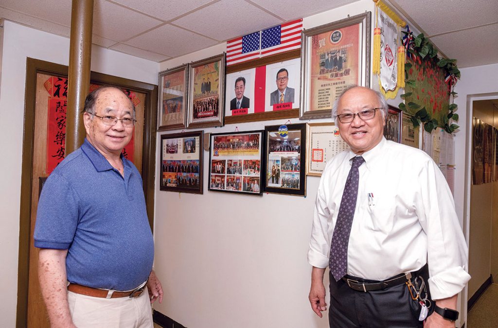 LONGSTANDING ASSOCIATION: Charles Chin, right, president of the On Leong Chinese Merchants Association on Pontiac Avenue in Cranston, meets with Peter Kwong, press relations officer of the association. The Rhode Island chapter of the association was established in 1911 and is still active today.  / PBN PHOTO/MICHAEL SALERNO