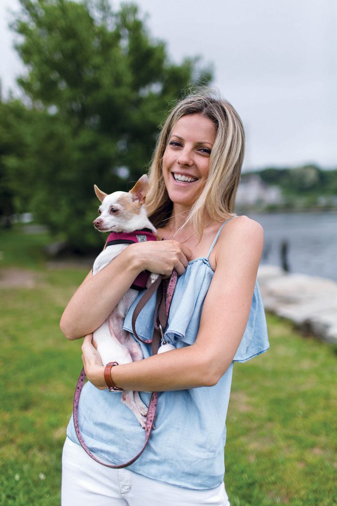 FRESH snacks: Lauren Ruggiero holds her chihuahua, Maui. Ruggiero launched Buppy Pets out of Hope & Main in Warren a year ago to produce made-from-scratch, healthy dog treats.
/ PBN PHOTO/RUPERT WHITELEY FRESH snacks: Lauren Ruggiero holds her chihuahua, Maui. Ruggiero launched Buppy Pets out of Hope & Main in Warren a year ago to produce made-from-scratch, healthy dog treats.
/ PBN PHOTO/RUPERT WHITELEY