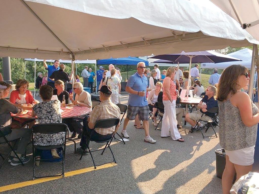 BUSINESS BARBECUE: Attendees gather for the Tri-Town Chamber of Commerce’s summer business barbecue in Mansfield in 2016. This year’s event welcomes all businesses regardless of Chamber membership and will be held July 26 at the Tri-Town Chamber of Commerce in Mansfield.
/ COURTESY TRI-TOWN CHAMBER OF COMMERCE BUSINESS BARBECUE: Attendees gather for the Tri-Town Chamber of Commerce’s summer business barbecue in Mansfield in 2016. This year’s event welcomes all businesses regardless of Chamber membership and will be held July 26 at the Tri-Town Chamber of Commerce in Mansfield.
/ COURTESY TRI-TOWN CHAMBER OF COMMERCE
