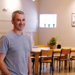 AGGRESSIVE GROWTH: Adam Lastrina, co-owner of Knead Doughnuts, is pictured at the company’s newest location at 135 Elmgrove Ave. on the East Side in Providence, which opened in April. The company opened its first location in downtown Providence in December 2016 and hopes to open four locations within five years.  / PBN PHOTO/KATE TALERICO