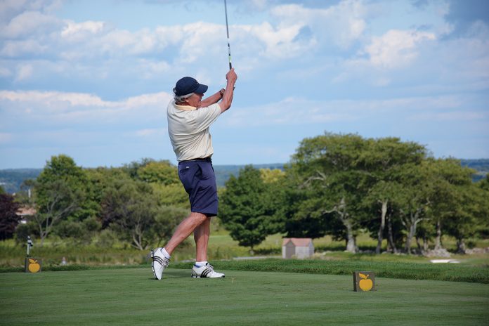 BIG SWING: A golfer takes a swing from the tee during a previous Preservation Society of Newport County Golf Outing at Newport National Golf Club in Middletown. The nonprofit will host its 18th annual outing at Newport National Golf Club Aug. 6.  / COURTESY PRESERVATION SOCIETY OF NEWPORT COUNTY
