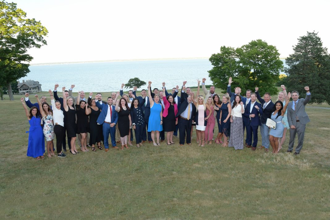 DSC_0273 THE 2018 CLASS OF PBN's 40 Under Forty program celebrate on the lawn of the Aldrich Mansion with Nassagansett Bay in the background on Thursday. / PBN PHOTO/MIKE SKORSKI