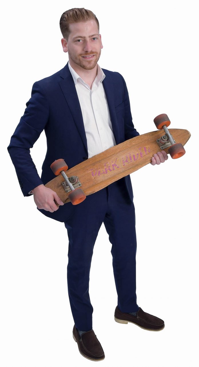the prop: The skateboard was the first product that was Custom Design made. Now the company makes Tiffany showcases and Vendi displays. / PBN PHOTO/MIKE SKORSKI