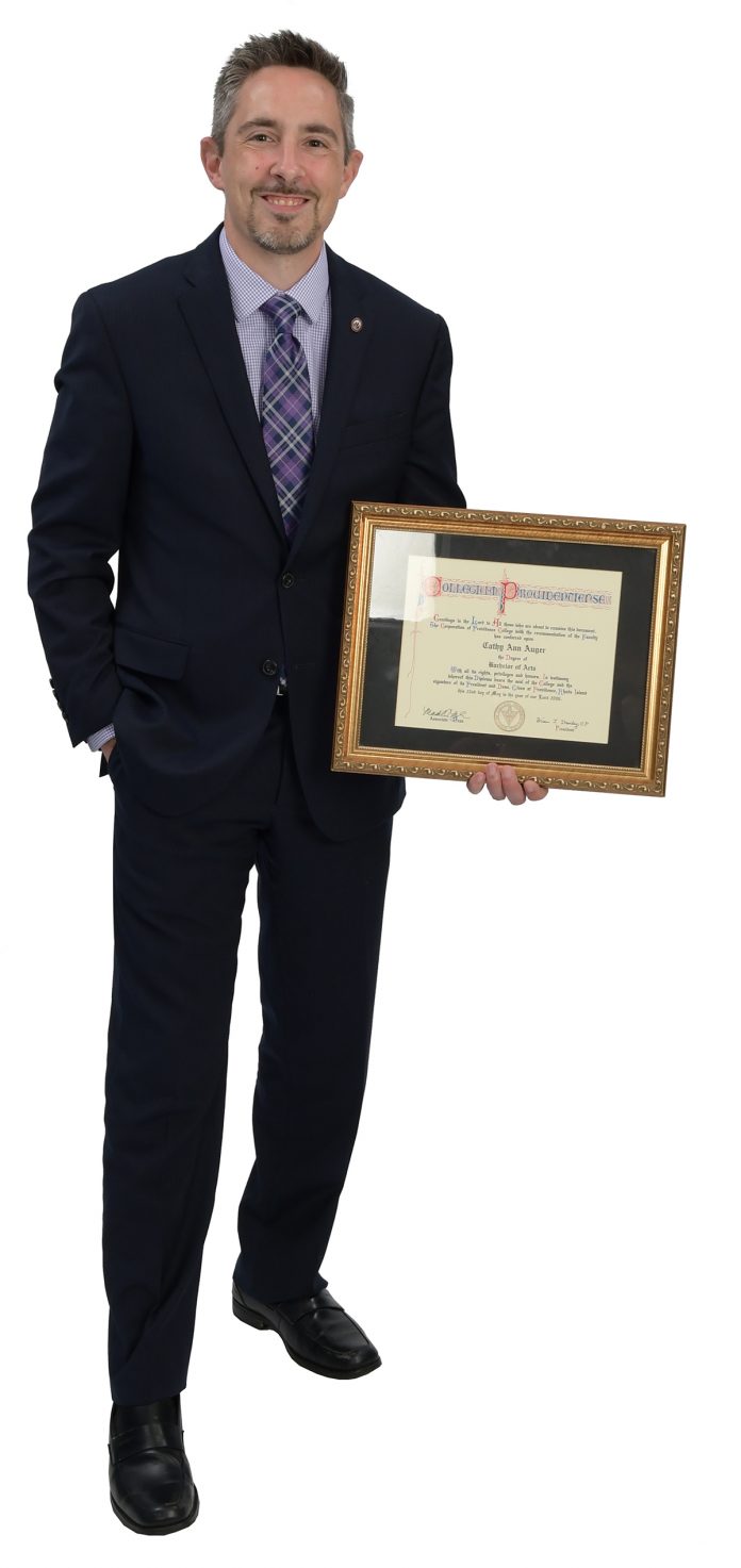 the prop: Edwin Pacheco brought his mother’s Providence College diploma. They worked on their degrees together, the first and second in the family to graduate, he from URI in 2005, she in 2006. / PBN PHOTO/MIKE SKORSKI the prop: Edwin Pacheco brought his mother’s Providence College diploma. They worked on their degrees together, the first and second in the family to graduate, he from URI in 2005, she in 2006. / PBN PHOTO/MIKE SKORSKI