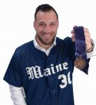 the prop: Tager’s University of Maine baseball jersey and his Team Maine academic award weave a story of how important his studies and pursuit of baseball were to him. / PBN PHOTO/MIKE SKORSKI