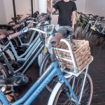 ELECTRIC BIKES: Tyler Justin is the owner of Providence-based Mission Electric, a shop selling and maintaining electric bicycles. E-bikes can be used on the street or bike trails but can be switched into electric mode on uphill climbs.  / PBN PHOTO/MICHAEL SALERNO