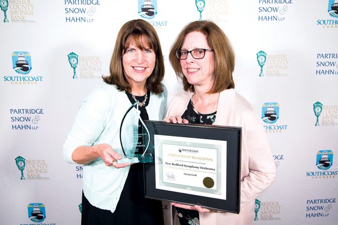 SOUND CHOICE: New Bedford Symphony Orchestra Director of Marketing Conee Sousa, left, and Communications Coordinator Patricia Burke accept the 2018 APEX Award from the SouthCoast Chamber of Commerce.  / COURTESY NEW BEDFORD SYMPHONY ORCHESTRA