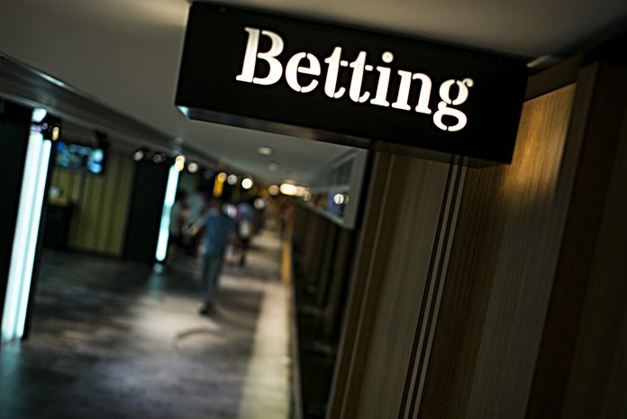 STATE, LOTTERY, local technology vendors reach agreement about sports betting management and announce tentative start date for mid-November. / BLOOMBERG NEWS FILE PHOTO/ JUSTIN CHIN