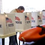 VOTING WILL begin in Rhode Island for the 2018 primary election on Wednesday. / BLOOMBERG NEWS FILE PHOTO/PATRICK T. FALLON