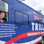 HITTING THE PAVEMENT: Gubernatorial candidate Joseph A. Trillo, a former Republican state representative who has owned several manufacturing and retail businesses in Rhode Island, is running as an independent in the Nov. 6 general election. Trillo uses two buses and a truck to travel around the state and spread his message to voters.  / PBN PHOTO/MICHAEL SALERNO
