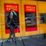 WELLS FARGO WILL pay Rhode Island $1.2 million as part of a $575 million, 50-state settlement over claims that the bank violated consumer protection laws in several capacities. / BLOOMBERG NEWS FILE PHOTO/ERIC THAYER