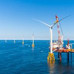 OFFSHORE WIND DEVELOPMENT lease rights for 390,000 acres of federal tracts south of Martha's Vineyard was auctioned for a record $405 million. Above the Block Island Wind Farm. / COURTESY DEEPWATER WIND