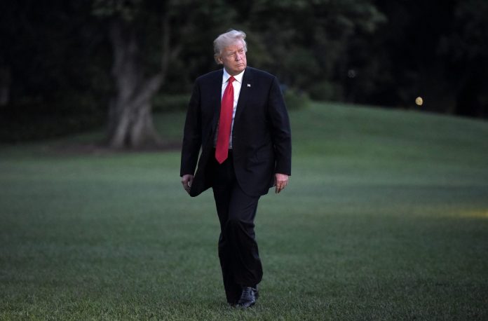 PRESIDENT DONALD TRUMP confirmed Friday that he told congressional leaders he’d keep the government closed for a year or longer if Democrats refuse to provide more money to construct a wall on the border with Mexico./ BLOOMBERG NEWS FILE PHOTO/OLIVIER DOULIERY