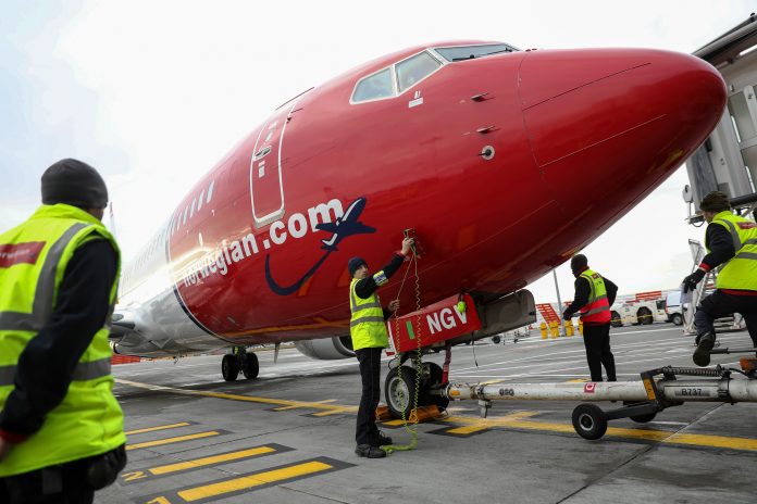 NORWEGIAN AIR Shuttle is raising $353 million in a rights issue underwritten by investors including shipping magnate John Fredriksen. / BLOOMBERG NEWS FILE PHOTO/SIMON DAWSON