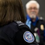 TRANSPORTATION SECURITY ADMINISTRATION agents work at a check point inside O'Hare International Airport in Chicago recently. With screeners calling in sick in larger-than-normal numbers, U.S. airports have been experiencing disruptions. / BLOOMBERG NEWS PHOTO/DANIEL ACKER