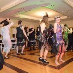 ATTENDEES DANCE during last year's Busy Buddies Foundation's Roaring '20s gala. This year's event will take place on Feb. 9 at Laurel Lane Country Club in South Kingstown. / COURTESY BUSY BUDDIES FOUNDATION