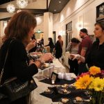 ATTENDEES SAMPLE desserts during the 2018 Girl Scouts of Southeastern New England Cookies & Cocktails event at the Crowne Plaza Providence-Warwick in Warwick. This year's event will be held on March 7 at the Crowne Plaza Providence-Warwick. / COURTESY GIRL SCOUTS OF SOUTHEASTERN NEW ENGLAND
