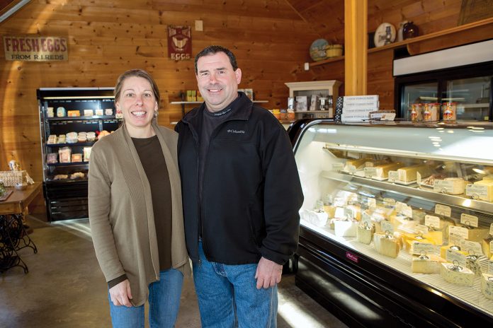 ONE-STOP SHOP: Bill and Diana Bothelo opened The Cheese Wheel in Tiverton in November. The shop sells packaged meats and cheeses, shown below.    / PBN PHOTO/KATE WHITNEY LUCEY