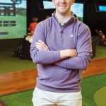 AVID GOLFER: Max Buerman is the owner of Newport Indoor Golf, a golfing facility in Portsmouth that features four virtual-reality bays with high-definition projection screens allowing golfers to play courses from around the world.  / PBN PHOTO/RUPERT WHITELEY