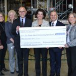 GOV. GINA M. RAIMONDO donates $50,000 raised from her 2019 Inaugural Committee to the Rhode Island Community Food Bank on Wednesday. Pictured, from left: Deborah Thurston, food coordinator for food bank member agency TAPIN; Kate Brewster, executive director for the Jonnycake Center of Peace Dale; Andrew Schiff, food bank CEO; Raimondo; First Gentleman Andy Moffit; and Lisa Roth Blackman, food bank chief philanthropy officer. / COURTESY RHODE ISLAND COMMUNITY FOOD BANK