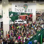 STUDENTS AND STAFF visit exhibits of businesses at the Junior Achievement of Rhode Island's JA Inspire Career Fair at the R.I. Convention Center in December 2018. / COURTESY JUNIOR ACHIEVEMENT OF RHODE ISLAND