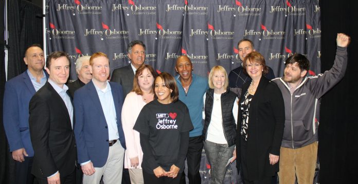 MORE THAN $60,000 was raised for Rhode Island-based nonprofits at the 2018 Jeffrey Osborne Celebrity Classic held at Foxwoods Resort Casino in July. Pictured, from left: Ernie Spaziano, Holy Family Home for Women and Children director; David Beauchesne, Rhode Island Philharmonic Orchestra & Music School executive director; the Rev. Edward Cardente, pastor of Holy Family Home for Women and Children; Mike Scarpetti, Boys & Girls Club of Providence director of operations; Robert Naparstek, Rhode Island Philharmonic board president; Annette Mozzoni, Rhode Island Philharmonic director of education; Nancy Diz Bain, co-director of the Met School; Jeffrey Osborne; Eileen Hayes, Amos House executive director; Ron Wright, Button Hole Golf Course executive director; Carlene Casciano-McCann, St. Mary’s Home for Children executive director; and Adam Bush, founding provost of College Unbound. / COURTESY JEFFREY OSBORNE FOUNDATION