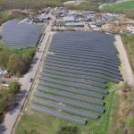 AN AERIAL VIEW shows more than 9,000 solar panels clustered to form the A Street solar energy farm, located at a former landfill in Johnston. The facility will be used to generate power for Johnston and Providence. / COURTESY SOUTHERN SKY RENEWABLE ENERGY RI