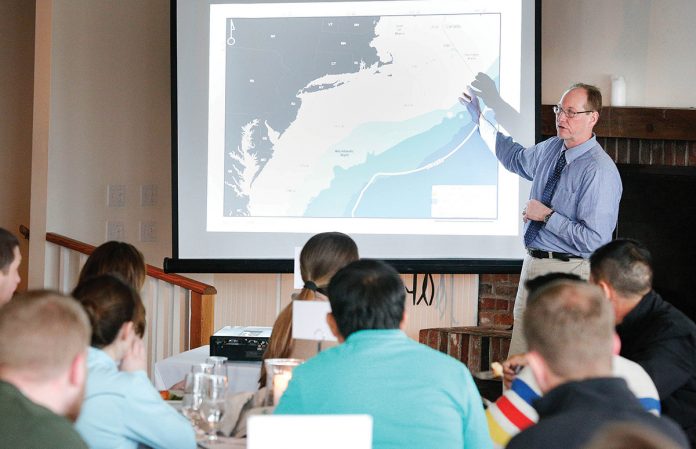 SEAFOOD DISCUSSION: Kevin D.E. Stokesbury, professor at the University of Massachusetts Dartmouth School for Marine Science & Technology, shares a presentation during last year’s International Seafood Buyers Luncheon.   / COURTESY SOUTHCOAST CHAMBER OF COMMERCE